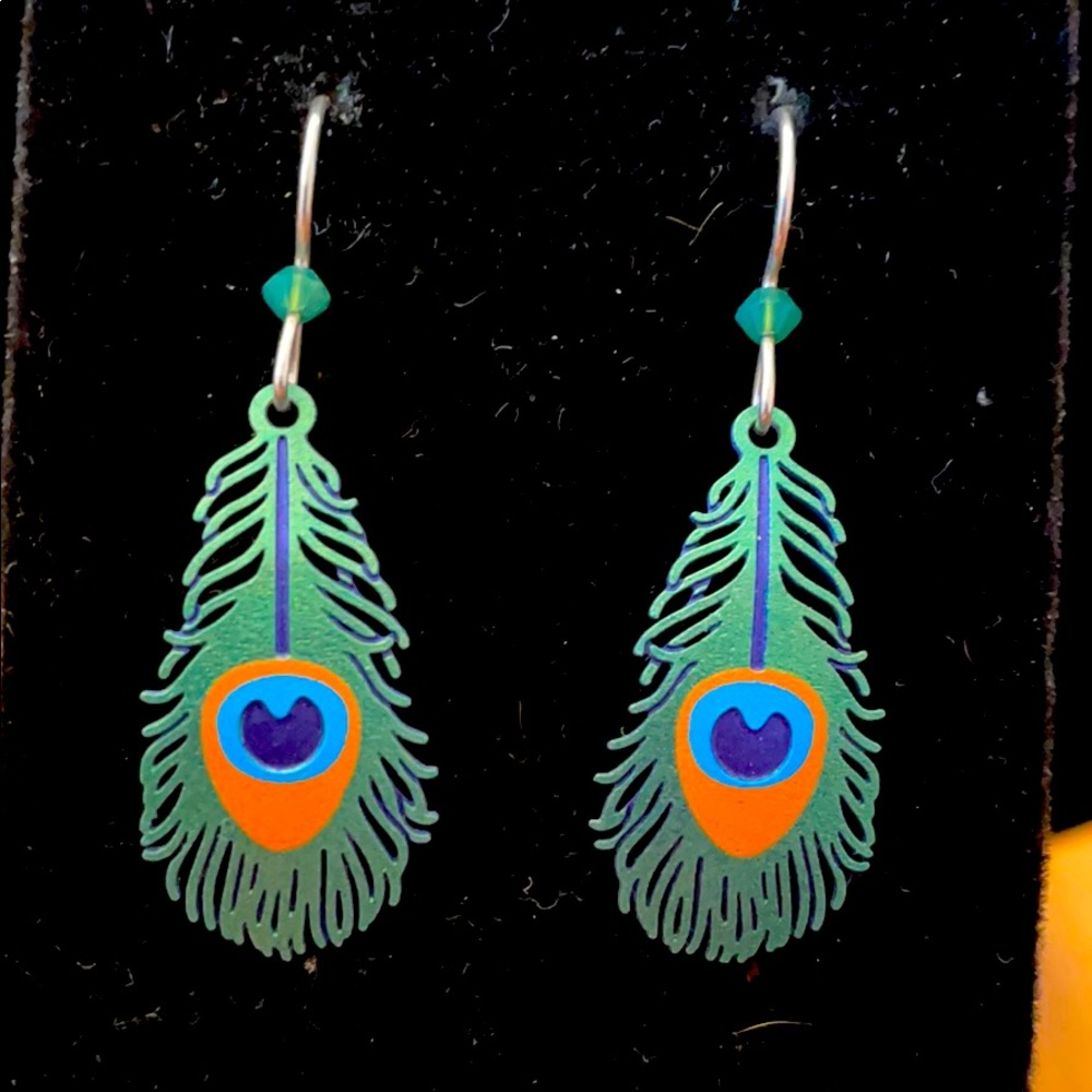 Peacock feather earrings.